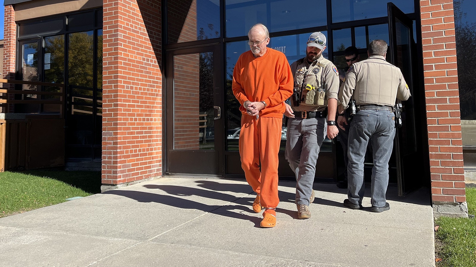 Donald Detimore, 72, of Lander, Wyoming, is led out of the Fremont County Courthouse on Thursday after he was sentenced to 40-50 years in prison for sexually abusing a 7-year-old girl.