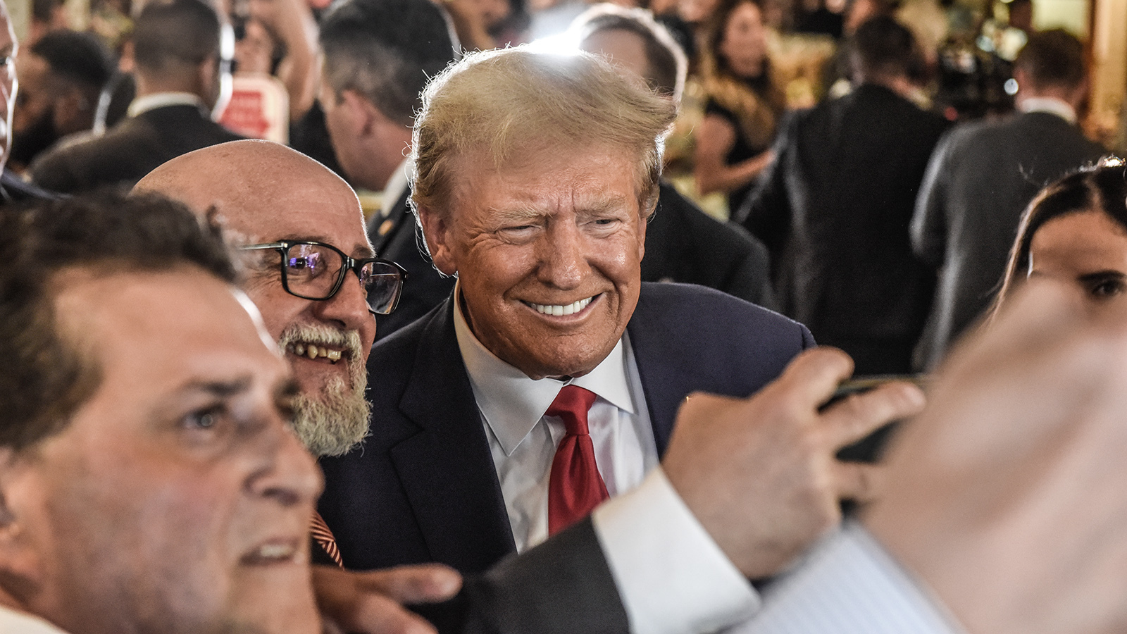 Former President Donald Trump arrives in Miami on Tuesday to be arraigned on a 37-count federal indictment.