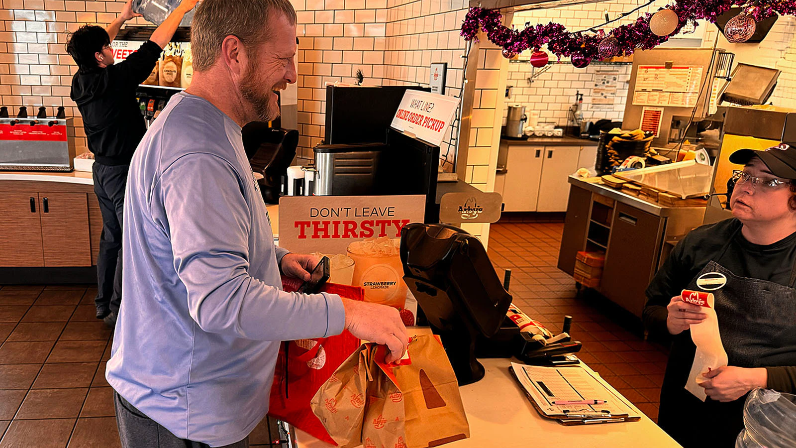 With gas prices up 82% across Wyoming since January, DoorDashers say they can't make any money with many deliveries, especiall in Wyoming, where they have to drive lots of miles to get to rural addresses. That's forcing them to decline more orders, which can trigger DoorDash to penalize them. Above, Mike Aumiller DoorDashes in Cheyenne in a CSD file photo.