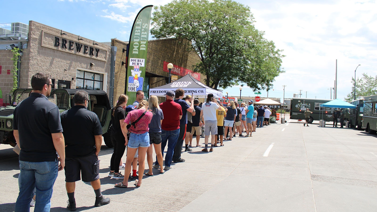 A long line of people wait for buffalo wings as Weitzel's Wings begins its world-record attempt at Freedom's Edge Brewing Co. in downtown Cheyenne on Friday afternoon.
