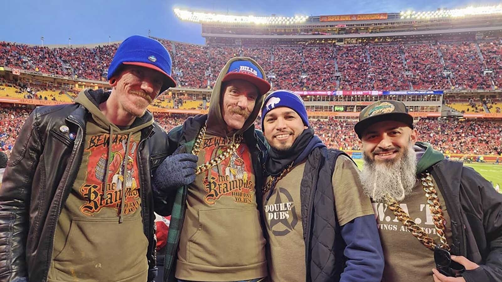 The Laramie-based Double Dub's Buffalo wings crew cheer for the Buffalo Bills at a game in 2023 against the Kansas City Cheifs.