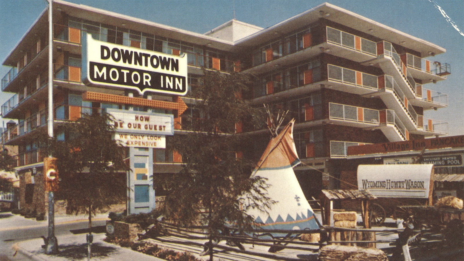A vintage postcard shows the iconic Downtown Motor Inn in Cheyenne in the 1960s.