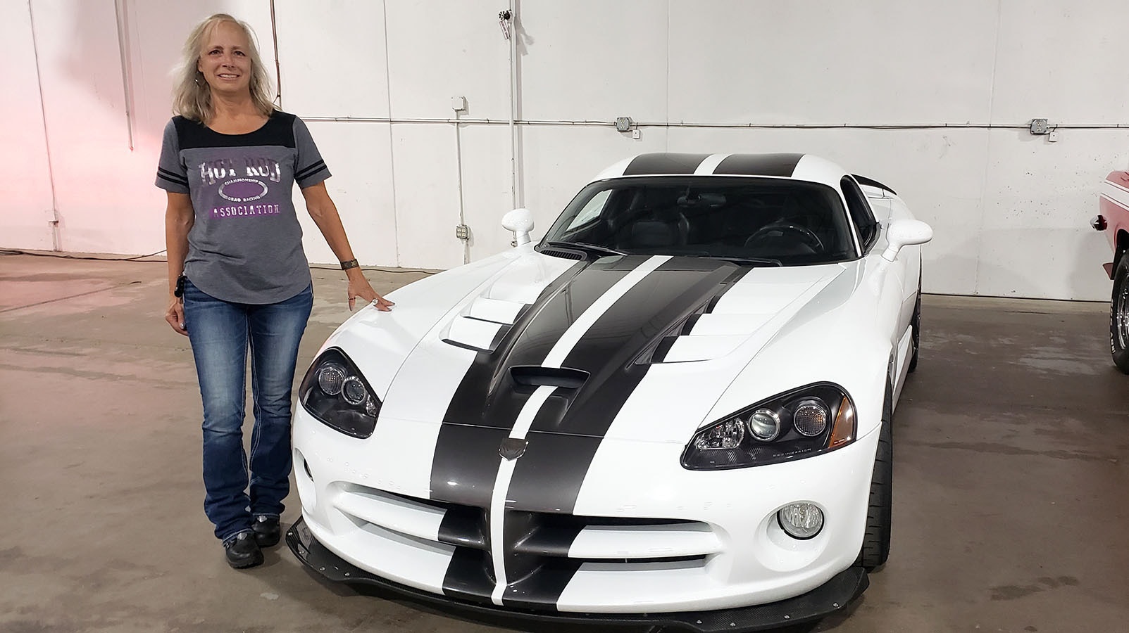 Desiree Hannabach with her dream car, a 2010 Dodge Viper.