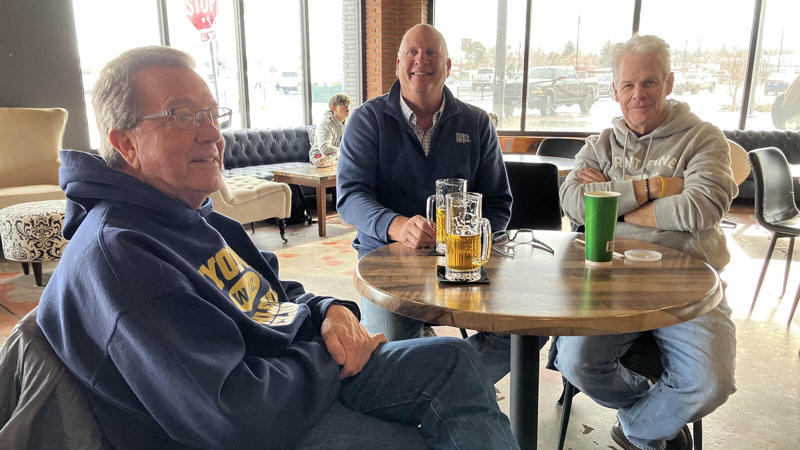 Gaslight Social customer John Lee, center, believes the Surgeon General should look at the substances banned by Europe and allowed in the United States rather than go after an updated alcohol warning label. With him at left is Cave Derell of Casper, and right, Charlie Chapin.