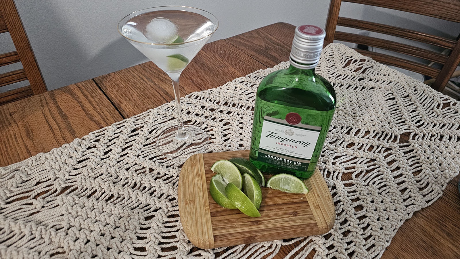 The gin and tonic is often served with a squeeze of lime.