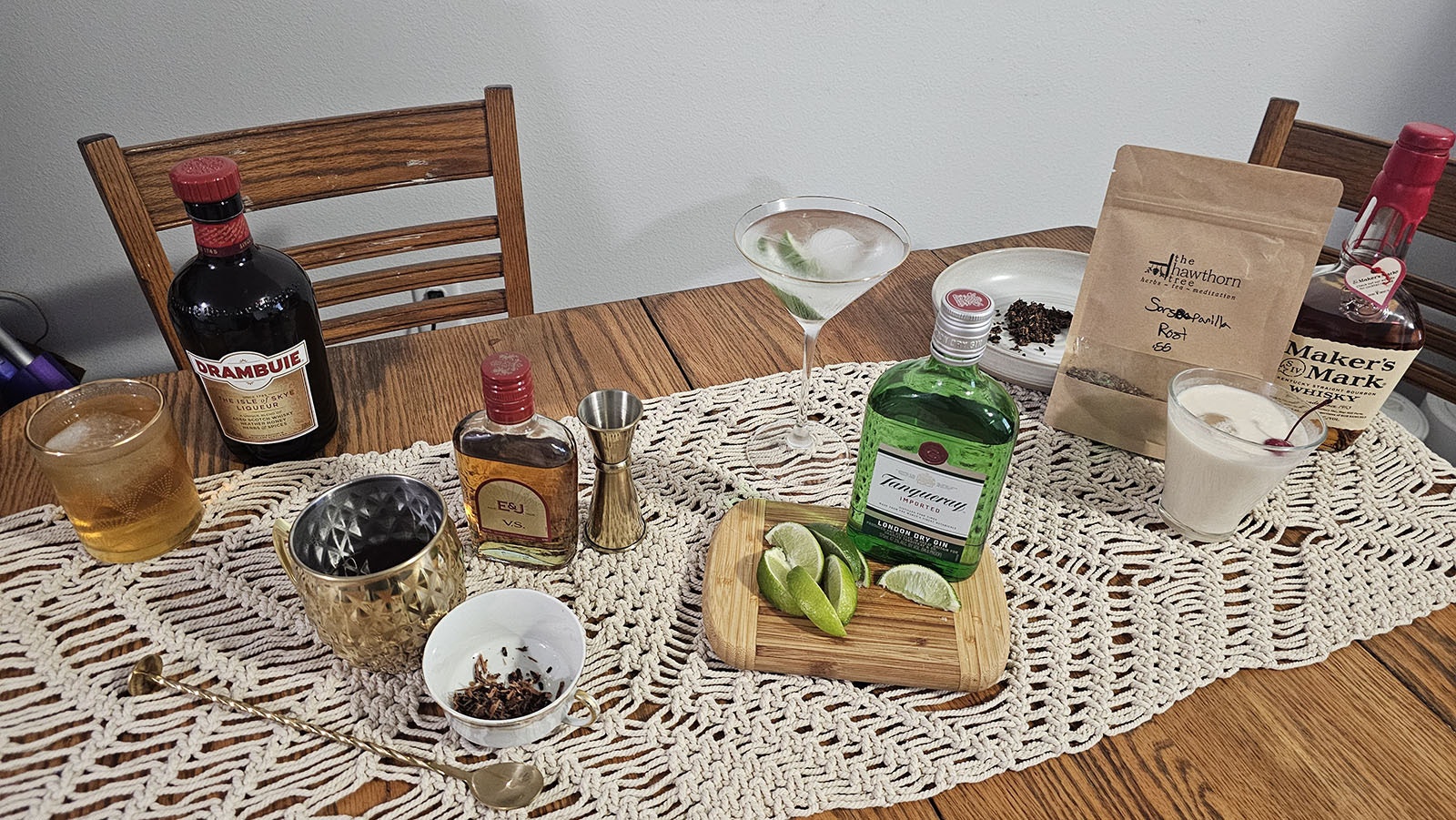 All of the drinks - Starting from left, the Rusty Nail (scotch and Drambuie), Where there's Willow There's a Way ( willowbank tea and brandy), Gin and Tonic with lime, and Revival Root (sarsaparilla tea, Makers Mark, and cream).