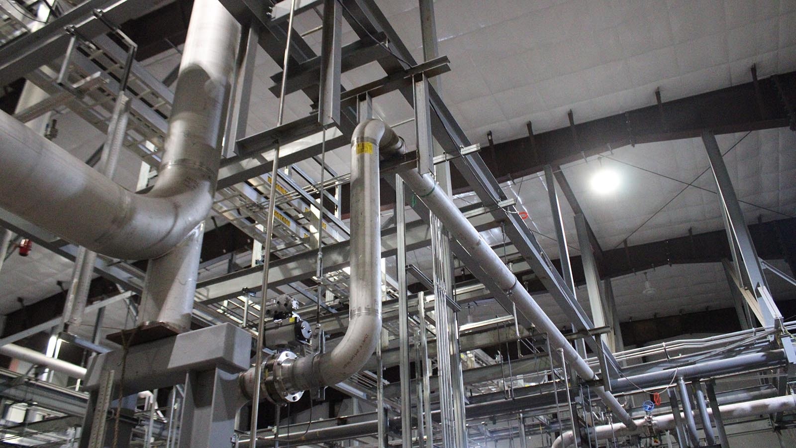 Campbell County Commissioner Jim Ford shows off the Integrated Test Center at Basin Electric Power Cooperative‘s Dry Fork Station, a coal plant that hosts carbon capture technology.