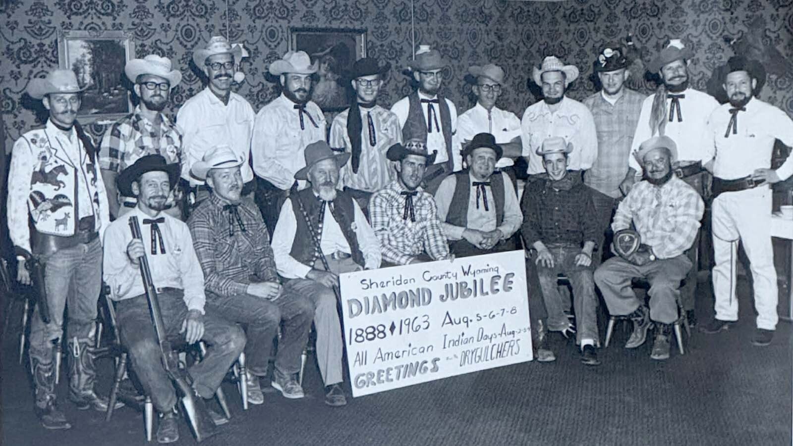 The Dry Gulchers were formed to celebrate Sheridan’s Jubilee in 1963 and continued their wild antics for many years to promote tourism in their community. In the photo from left seated are Mike Kuzara, Larry Cook, Joe Skatula, Jack Hayward, Bud Davis, Bobby Kuzara and Buster Adams. Standing from left are Rustly Castle, Glen Fairbanks, Tom Orr, Sonny Richards, Chuck Clark, Don Apperson,  Al Boode,  Joe Fiedor, Fred Davis, Bob Rousch and Ed Brantz.