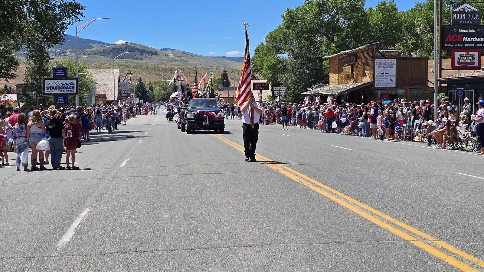 The parade begins in Dubois, where thousands gathered to celebrate America.