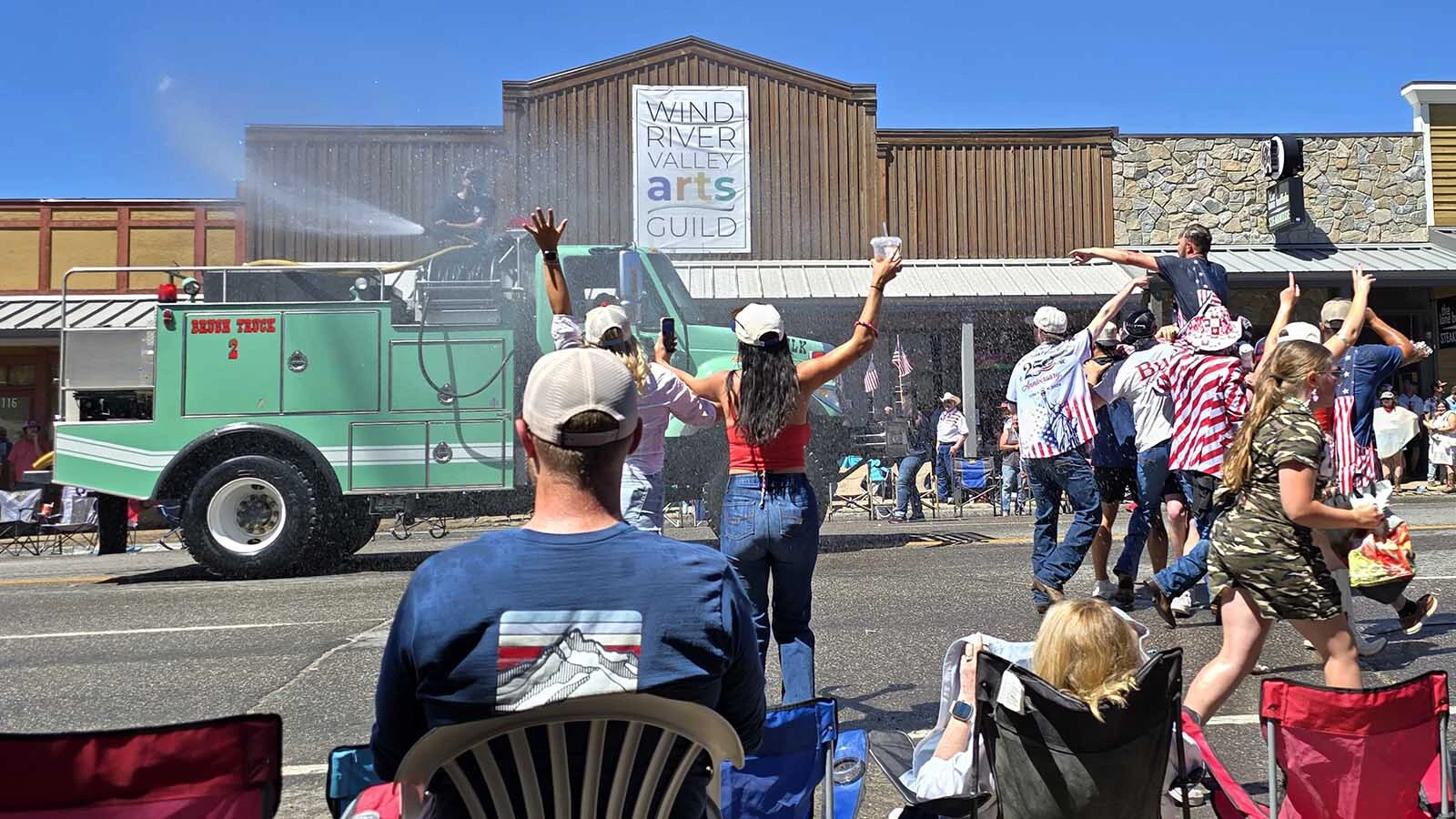 The finale of the grand parade were water trucks, spraying everyone and cooling them down.