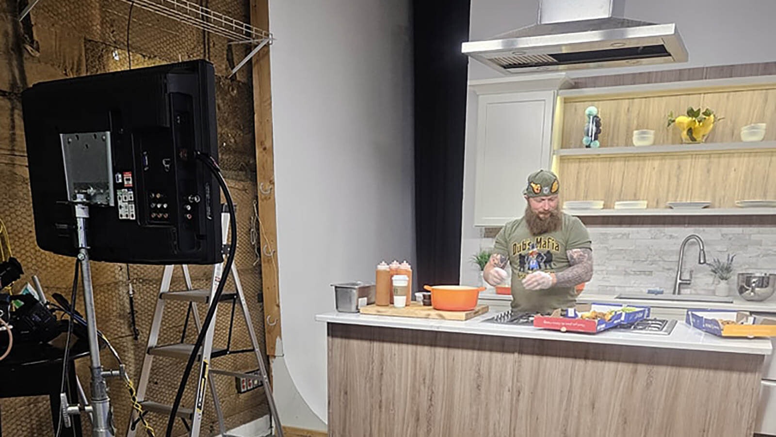 Weitzel's Wings owner Trent Weitzel does a cooking demonstration on Daytime Buffalo on WIVB TV Channel 4 in Buffalo on Wednesday.