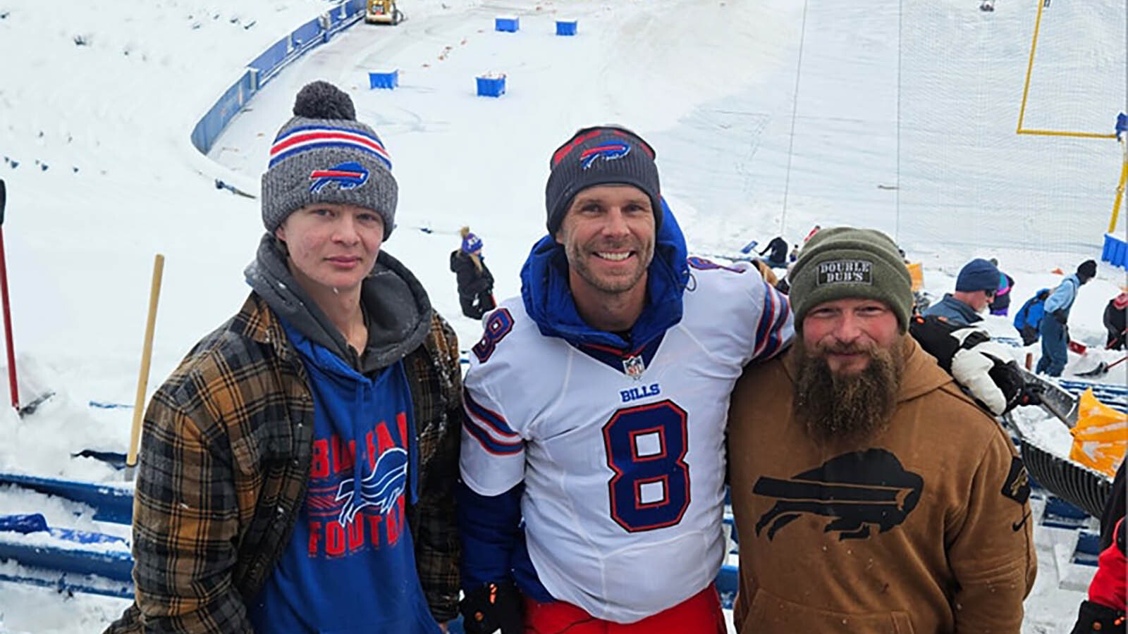 While helping shovel out Highmark Stadium in Buffalo on Friday in preparation for Sunday's playoff game between the Buffalo Bills and Kansas City Chiefs, the Double Dubs crew was surprised to meet former NFL punter Brian Moorman. Here he poses with Ransom Kessler, left, and Trent Weitzel.