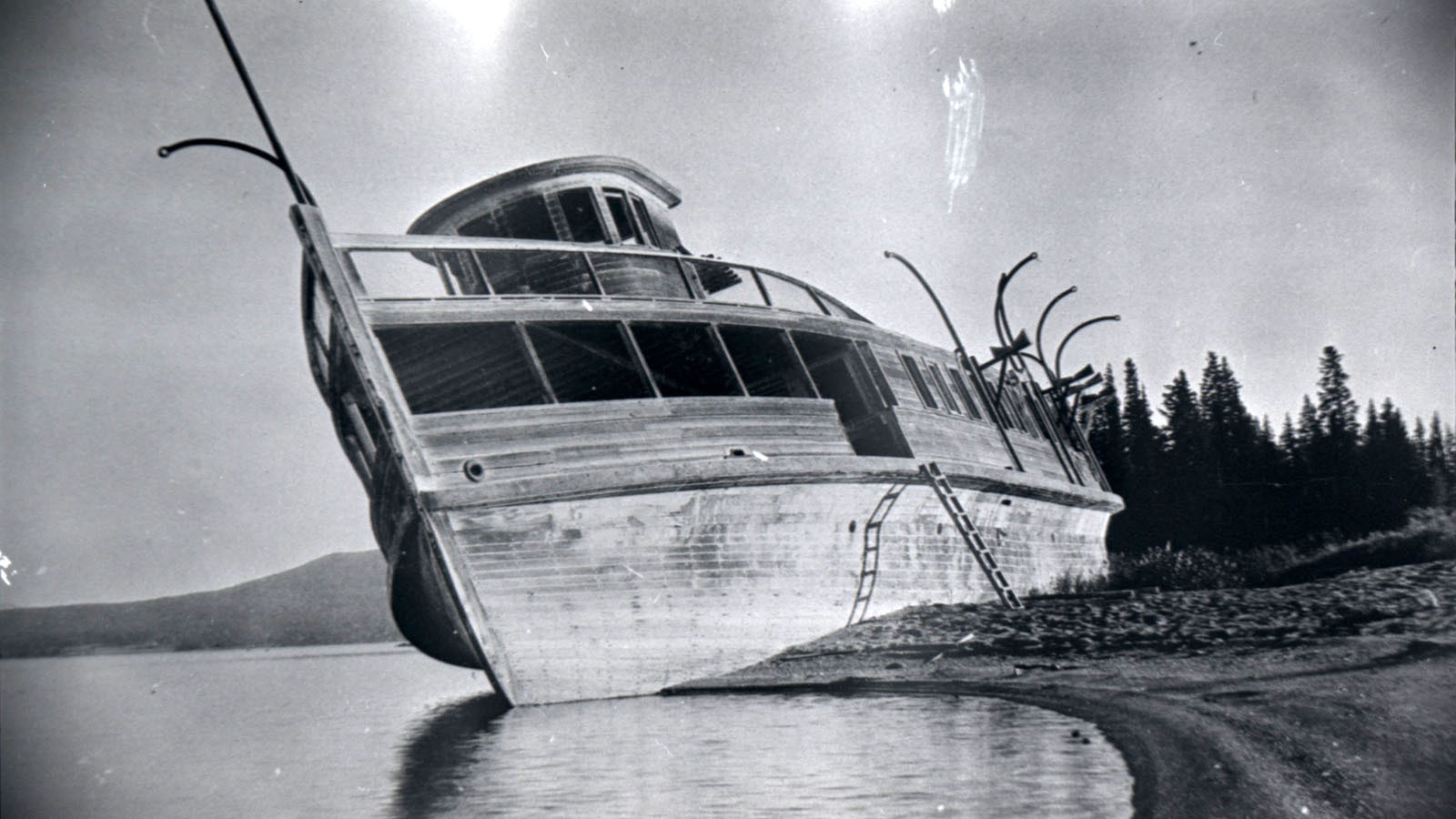 The wreck of the E.C. Waters has been slowly rotting, rusting and deteriorating on the shore of Stevensoon Island on Yellowstone Lake.