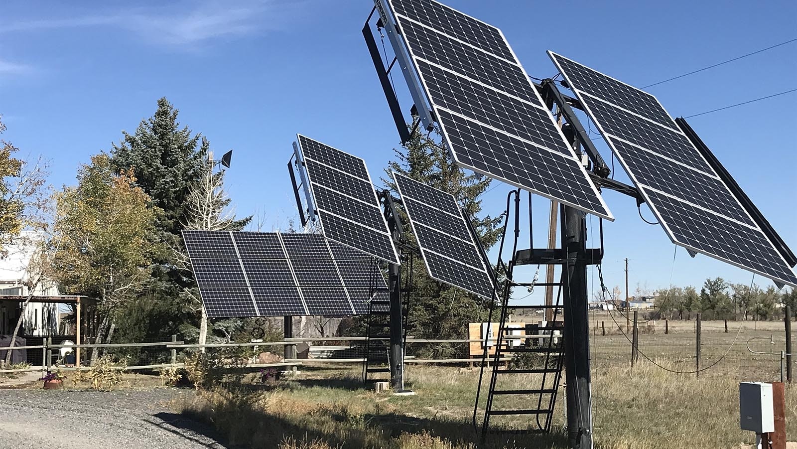 Solar panels produce power for Dr. Jason Bloomberg at his home outside Cheyenne.