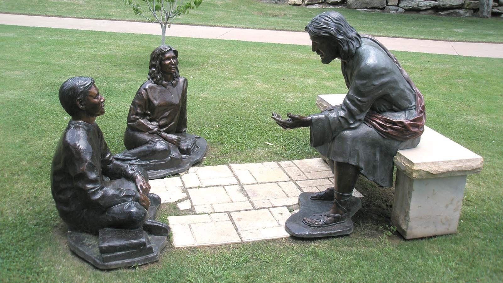 "The Master Teacher" by Beverly Paddleford of Lander, Wyoming, at Oral Roberts University. It features a larger-than-life Jesus with students at his feed.