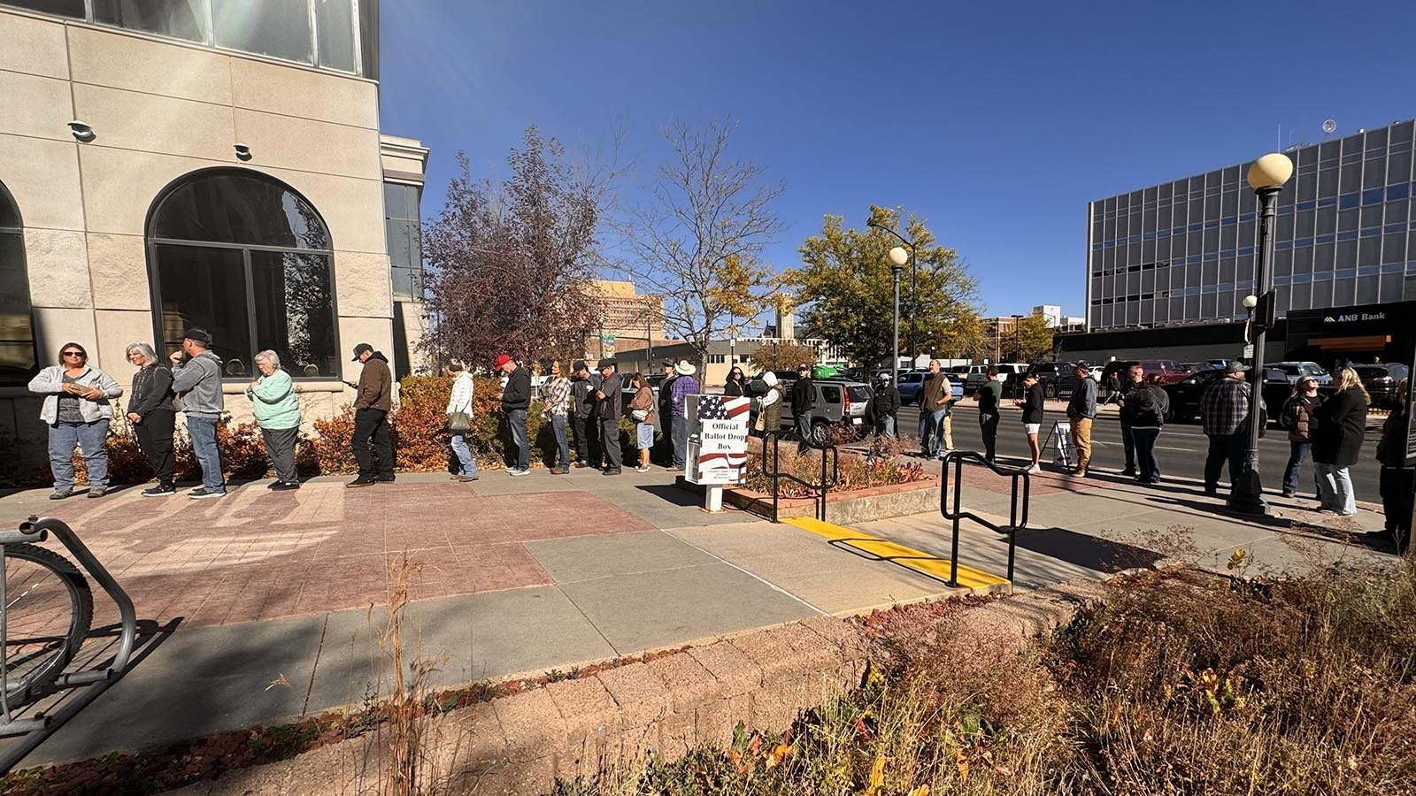 The line for early voting at the Laramie County Clerk's Office in Cheyenne was out the door and onto the sidewalk on Friday, Oct. 25, 2024.