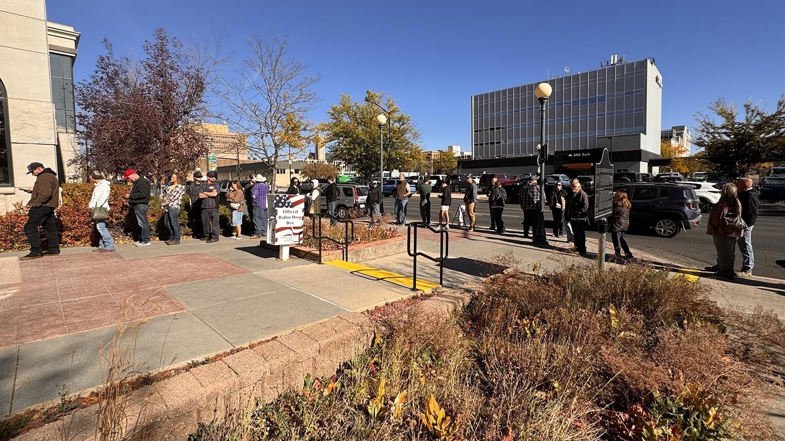 The line for early voting at the Laramie County Clerk's Office in Cheyenne was out the door and onto the sidewalk on Friday, Oct. 25, 2024.