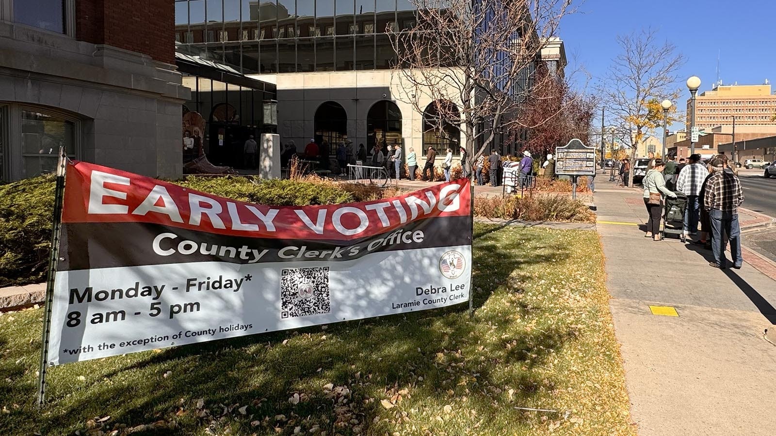 The line for early voting at the Laramie County Clerk's Office in Cheyenne was out the door and onto the sidewalk on Friday, Oct. 25, 2024.