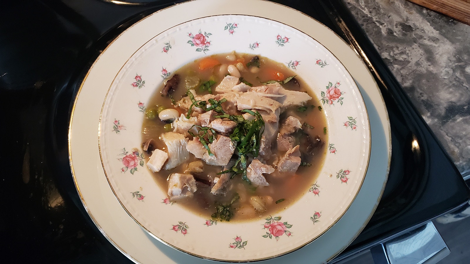 Top soup made from an Eat Wyoming veggie box with some leftover holiday turkey for a hearty, healthy meal.