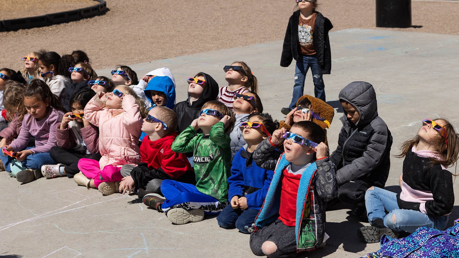 Kindergartners at Arp Elementary view the eclipse in Cheyenne, Wyoming on April 8, 2024.