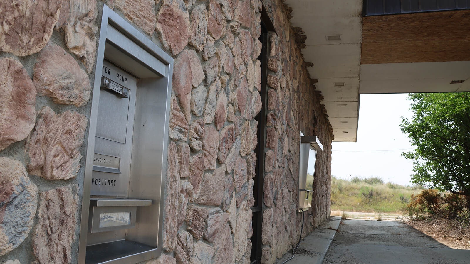 A long-shuttered bank sits at the corner of North Second Street and  Wyoming State Highway 387.