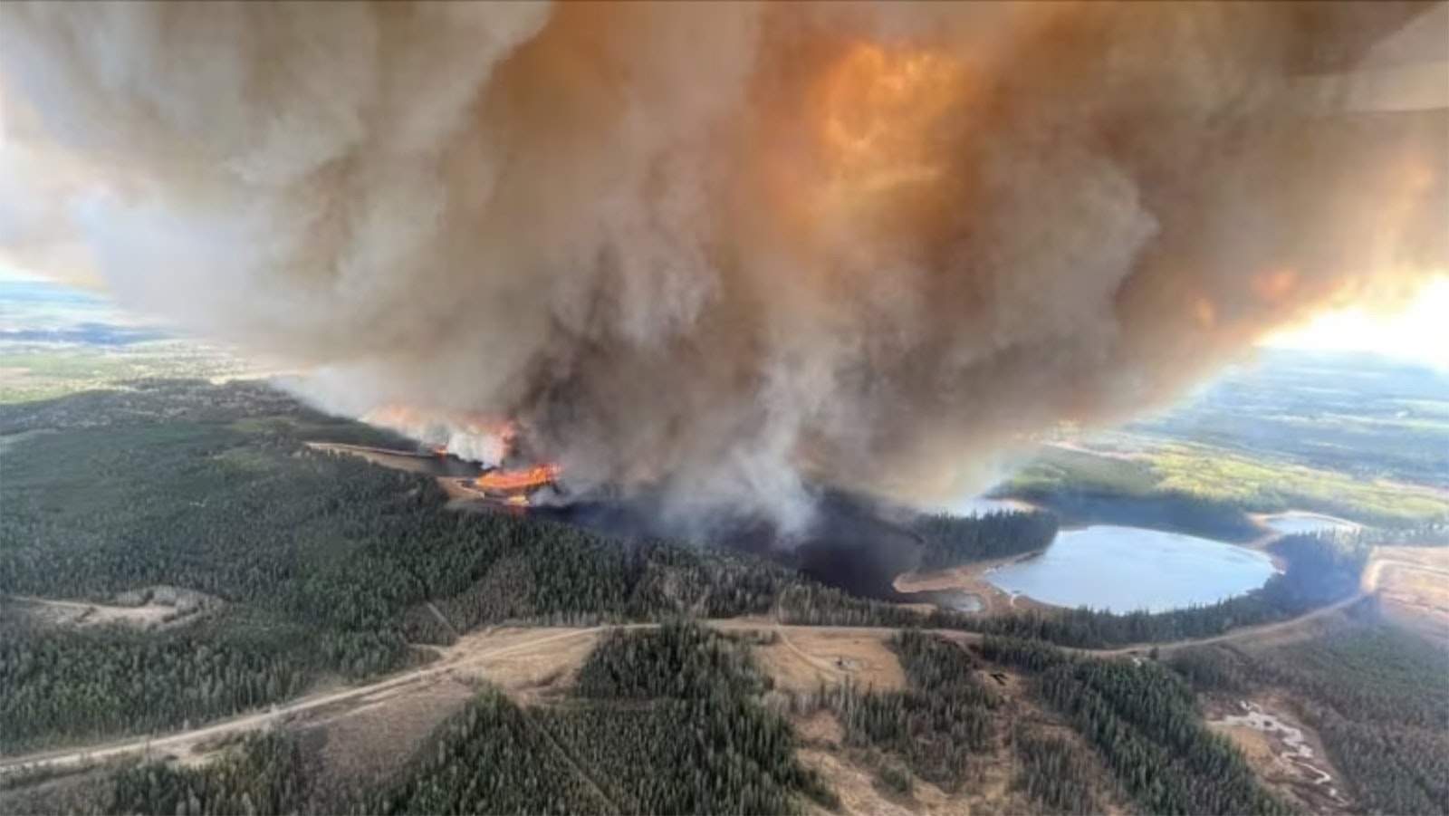 The Edson Fire in Alberta, Canada, burns, sending huge plumes of smoke into the atmosphere.