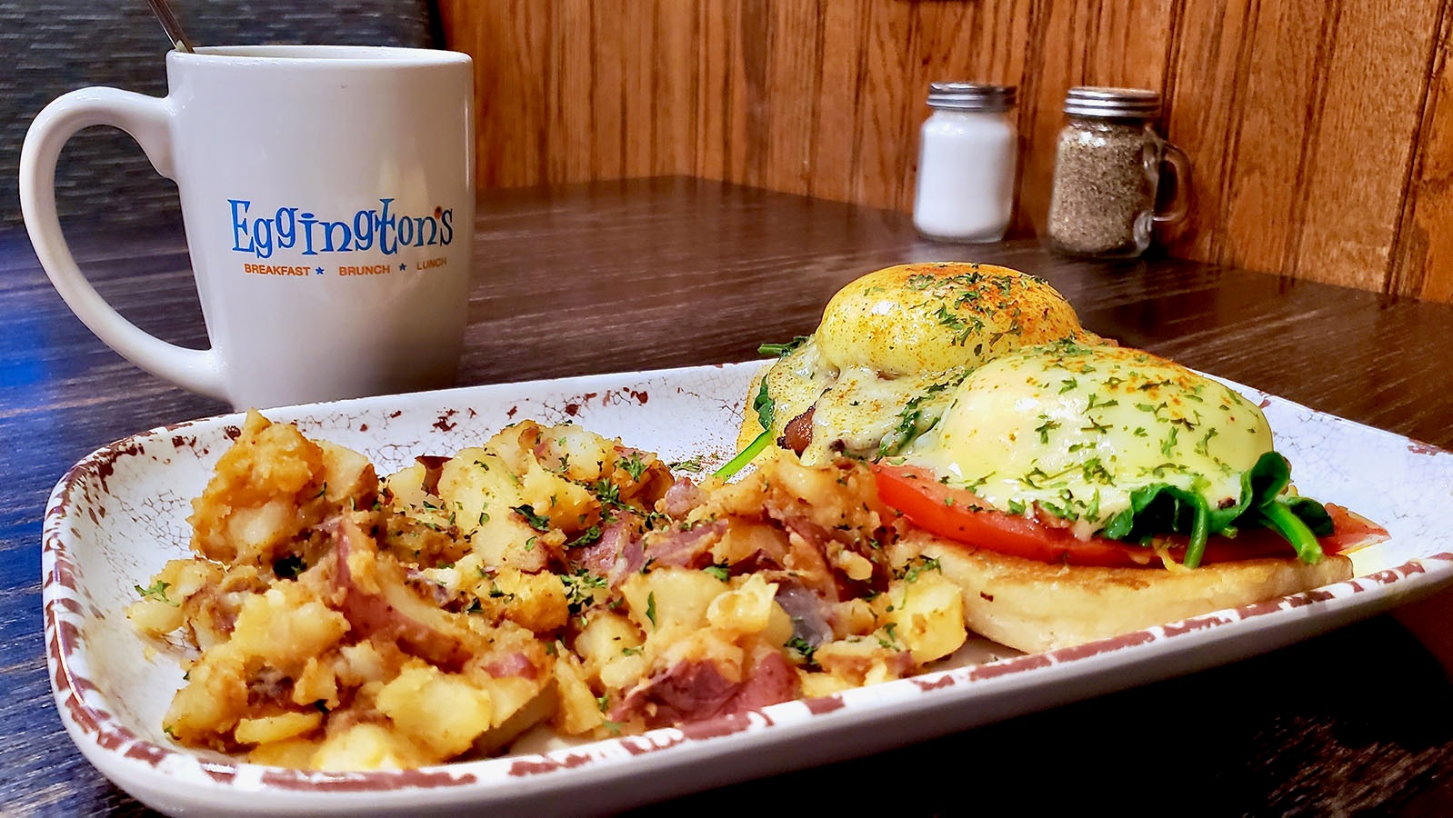 Egginton's in Casper is known for its variety of eggs Benedicts, like this one Florentine style with red-skinned potatoes and coffee.