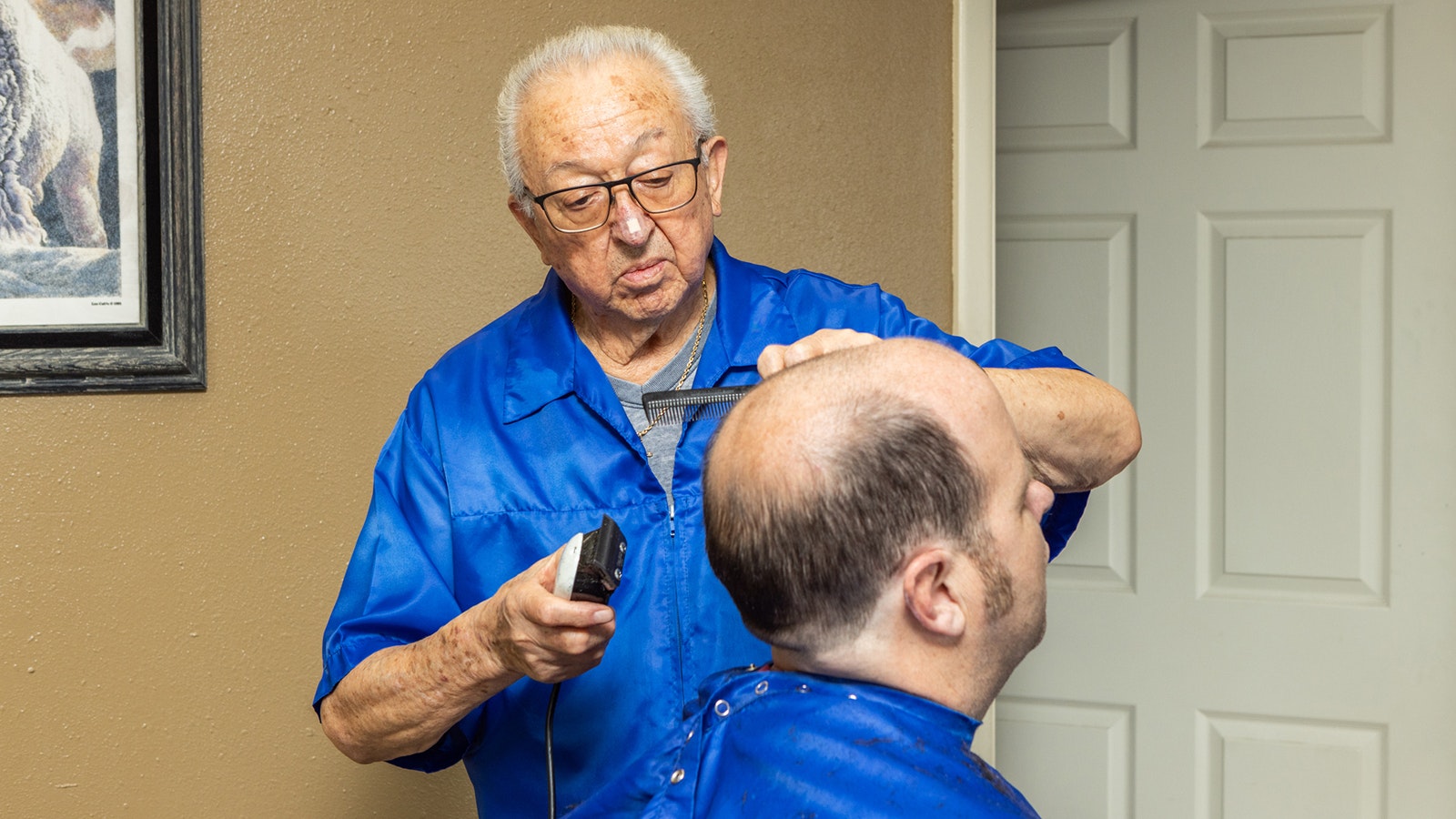 Eli Trujillo, 86, cuts Jeff Weehunt's hair at Trujillo's Barber Shop at 412 Randall Ave. in Cheyenne. At 86, Trujillo still cuts hair five days a week.