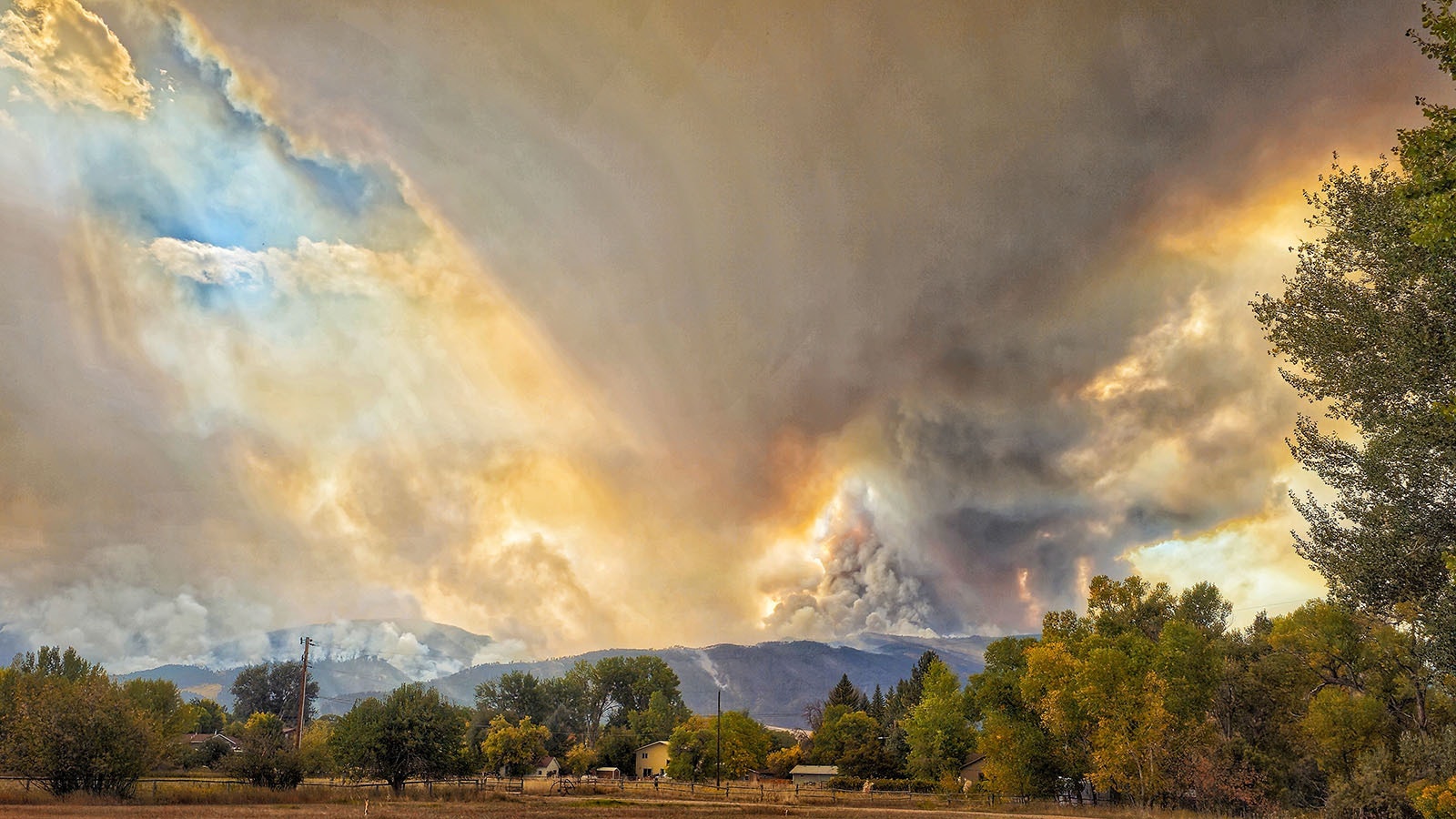 The Elk Fire remains active in northern Wyoming, putting out large plumes of smoke.