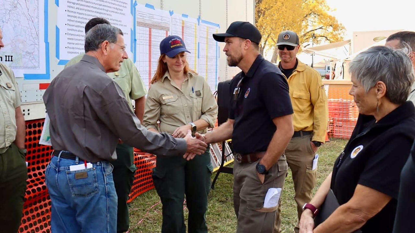 U.S. Sen. John Barrasso, R-Wyoming, visits with firefighters and support crews at the Elk Fire's base camp Friday, Oct. 11, 2024.