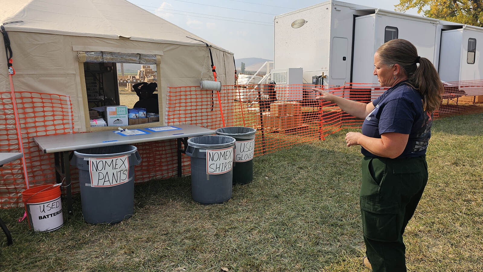 Jessica Brewen talks about the supply tent, where firefighters can order all kinds of things that they need, including the Nomex firefighter clothing, which is fire resistant.