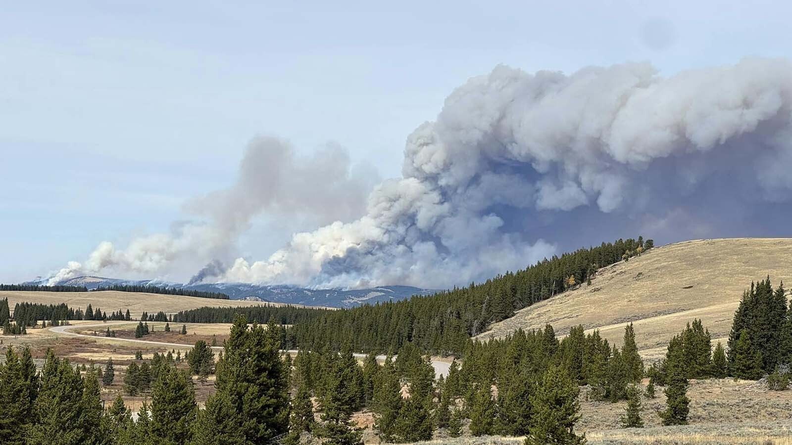 At the Elk View Inn near Dayton, the Elk Fire appears intimidating. Although an estimated 7-8 miles away, it appears huge and threatening.