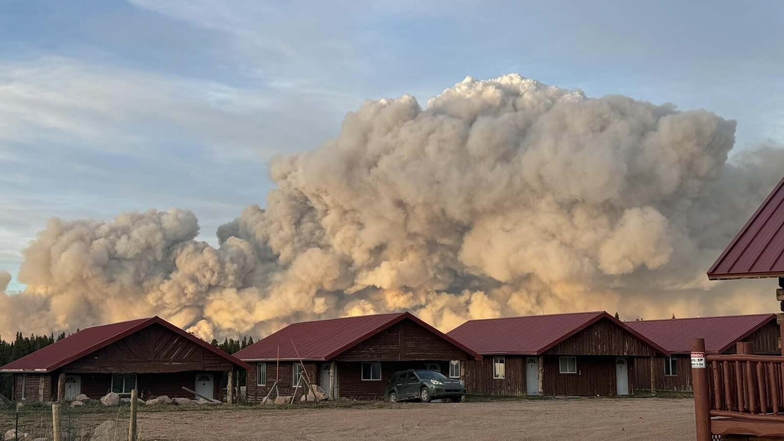 At the Elk View Inn near Dayton, the Elk Fire appears intimidating. Although an estimated 7-8 miles away, it appears huge and threatening.