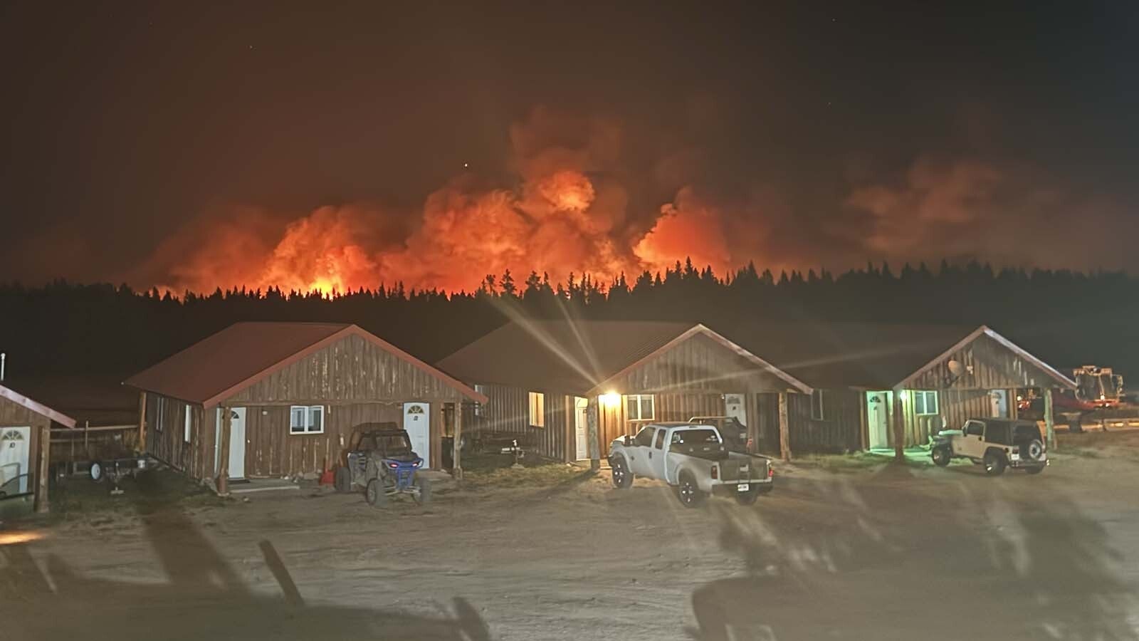 At the Elk View Inn near Dayton, the Elk Fire appears intimidating. Although an estimated 7-8 miles away, it appears huge and threatening.