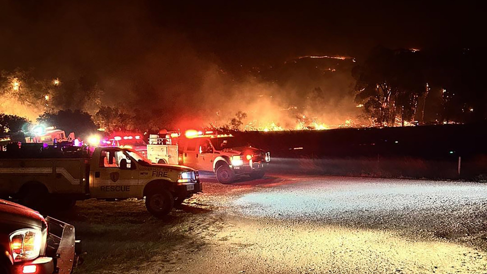 Equipment and personnel from the Goose Valley Fire Department in Sheridan County fighting the Elk Fire west of Dayton and Parkman.