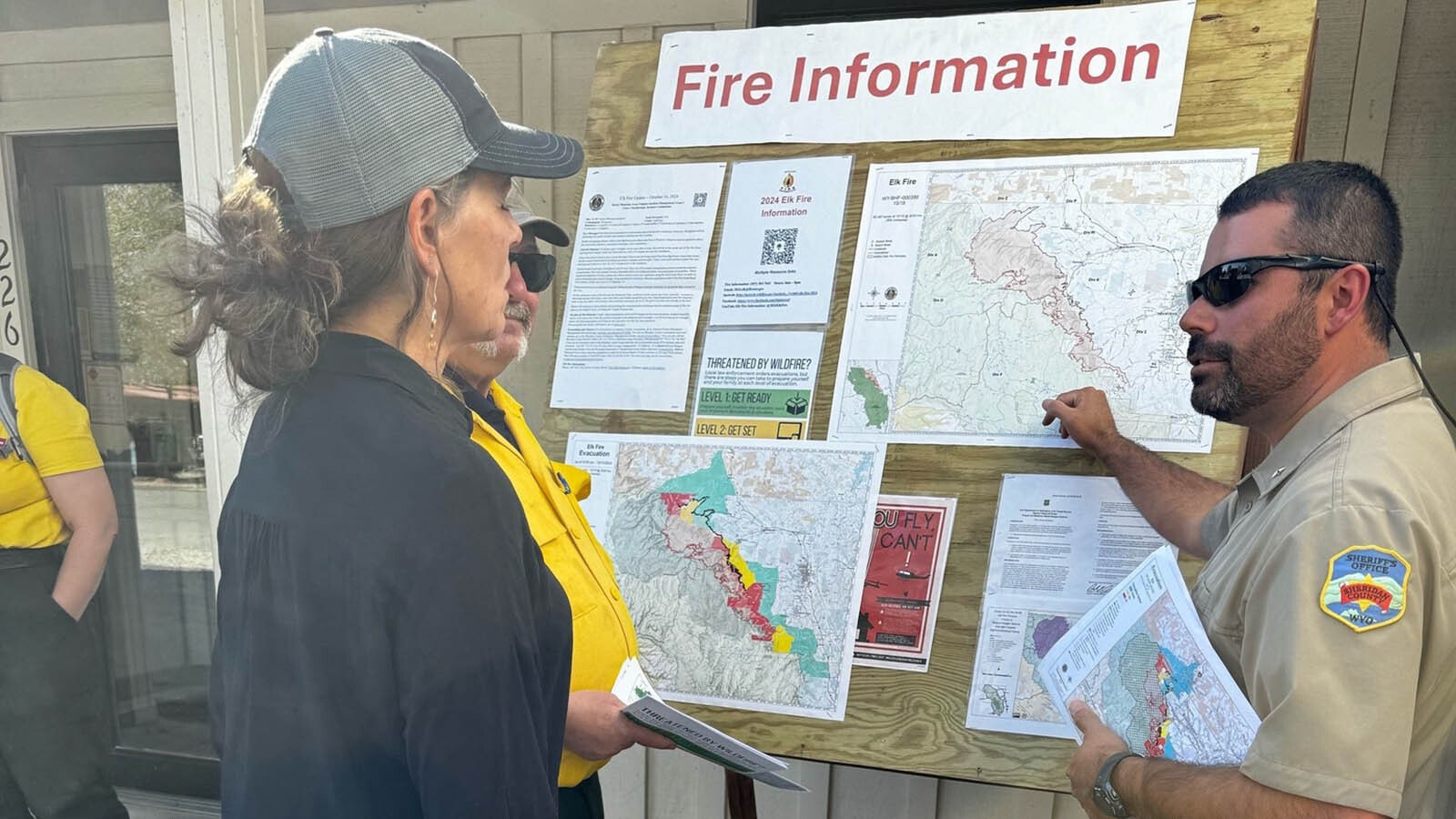 Sheridan County Sheriff Levi Dominguez, right, and his team have spent the last three weeks handling evacution orders and keeping people in the area of the Elk Fire informed.