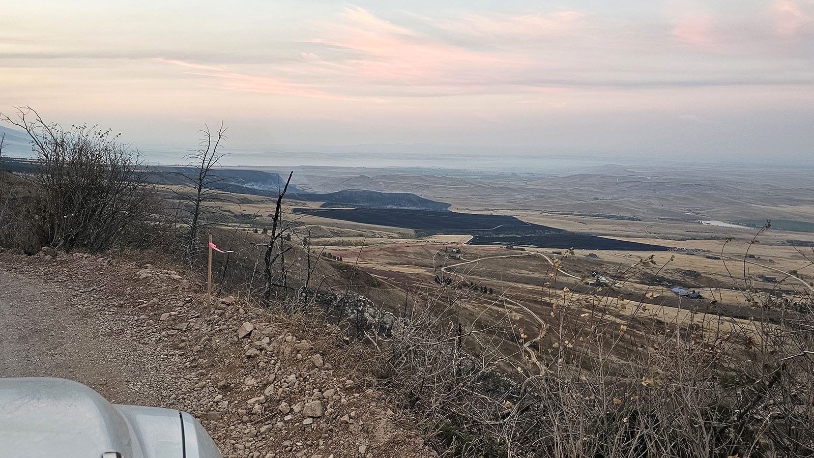 The burned strip of land seen from above stretches 7 miles from Goose Creek down to Red Grade Road. It's between one-half to three-quarters of a mile wide.