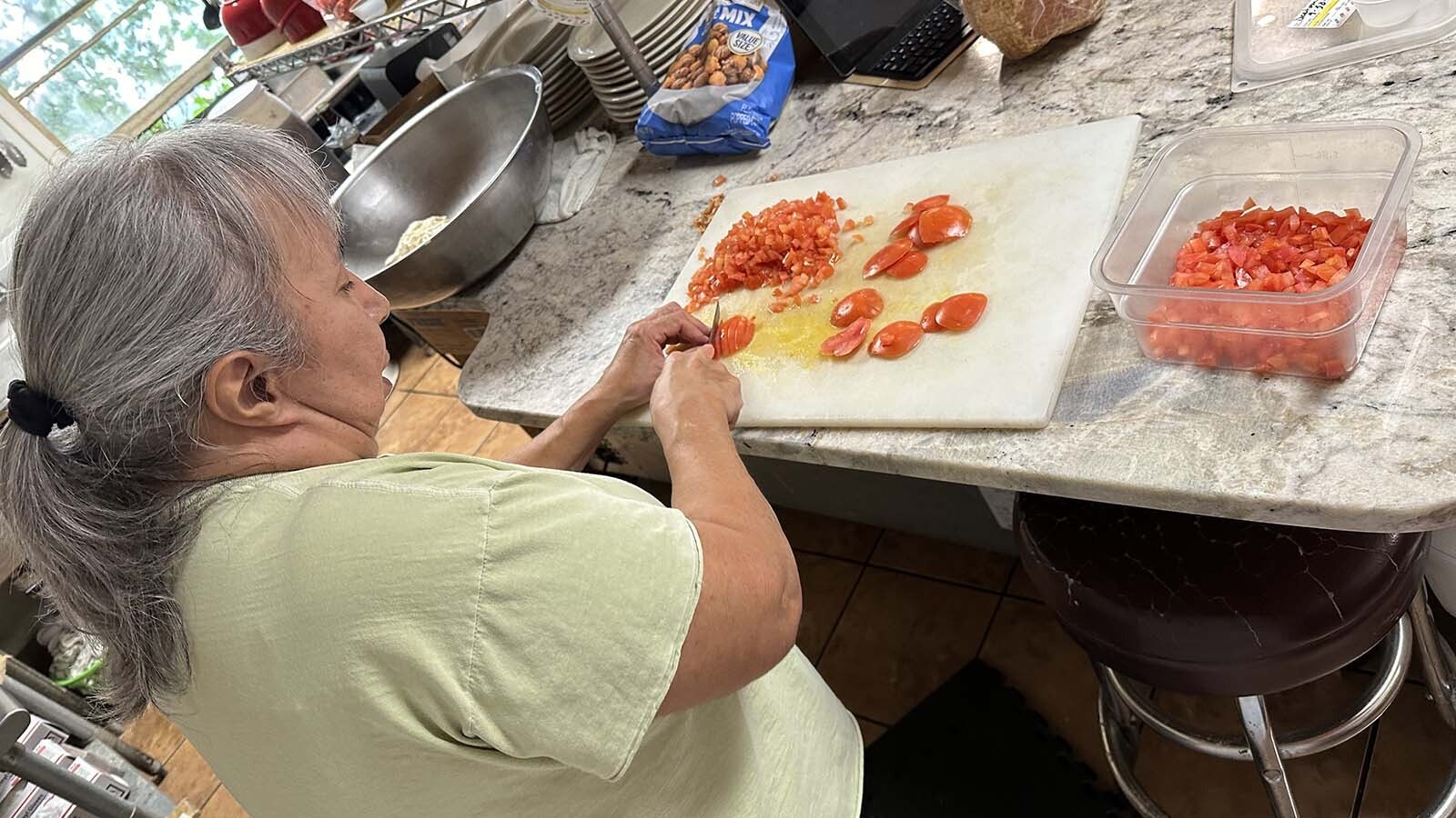 Folks at the Parkman Bar and Grill are busy making hundreds of breakfast burritos a day and other meals and treat bags for firefighters working the Elk Fire and their families.