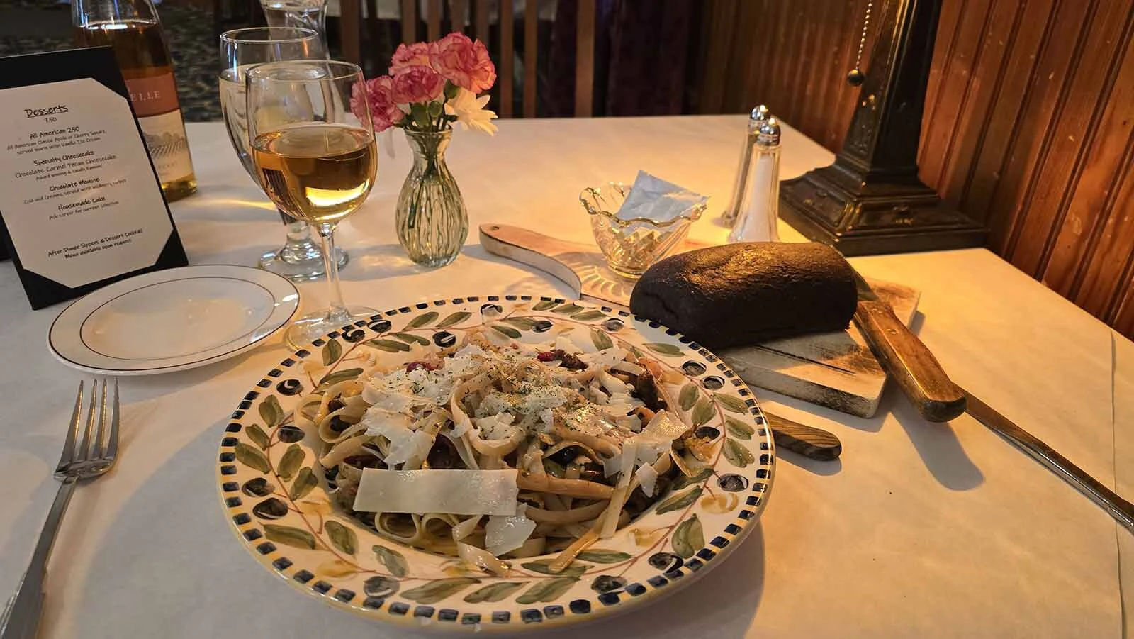 Dinner options include pasta and steak.