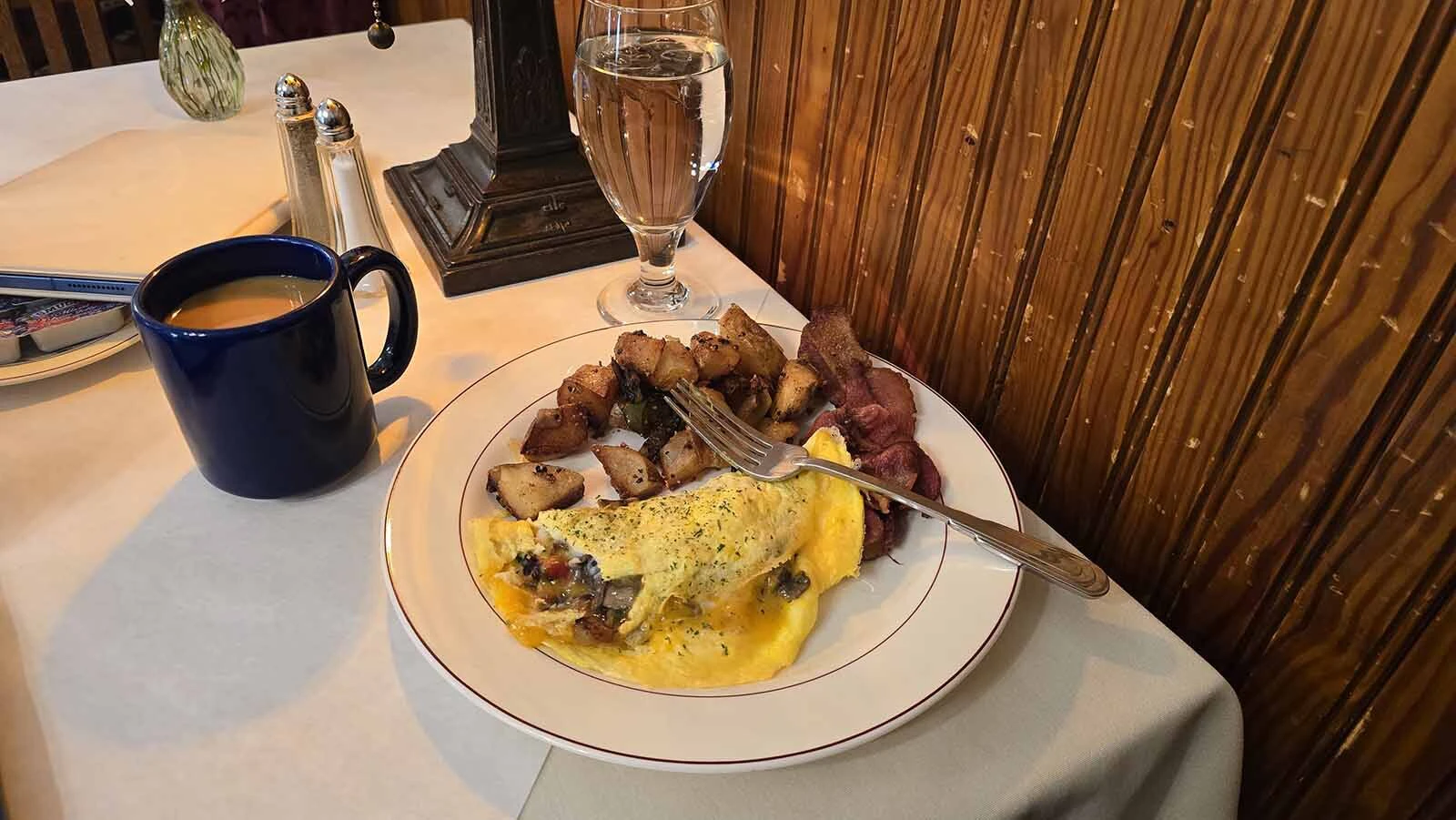 Breakfast options at Elk Mountain Hotel include freshly made omelets and coffee.