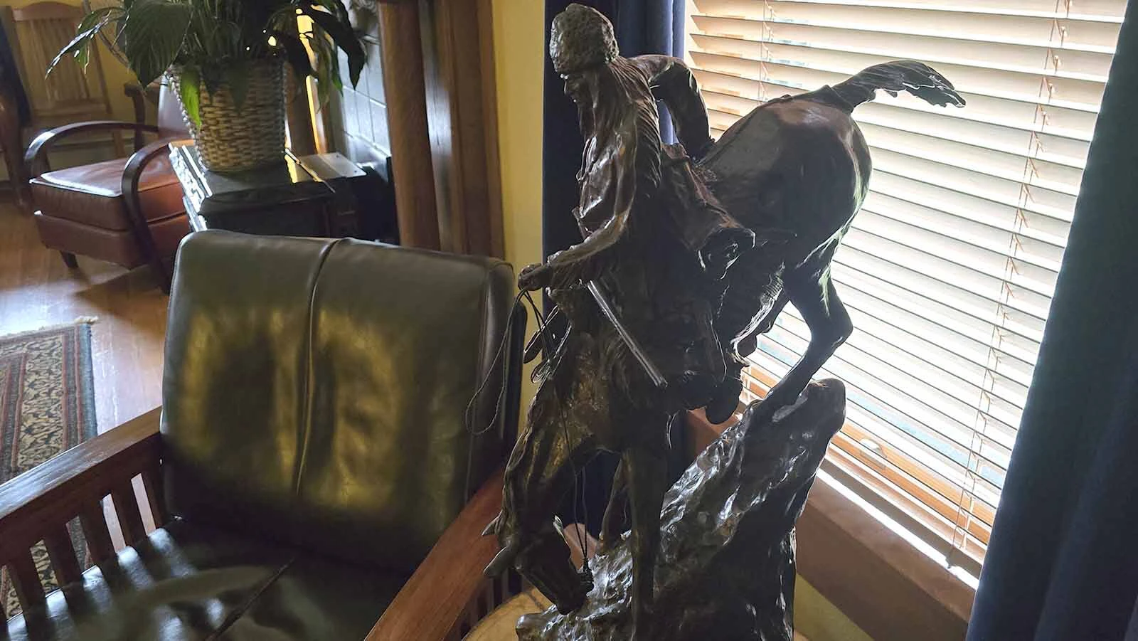 One of the bronze statues at Elk Mountain Hotel.