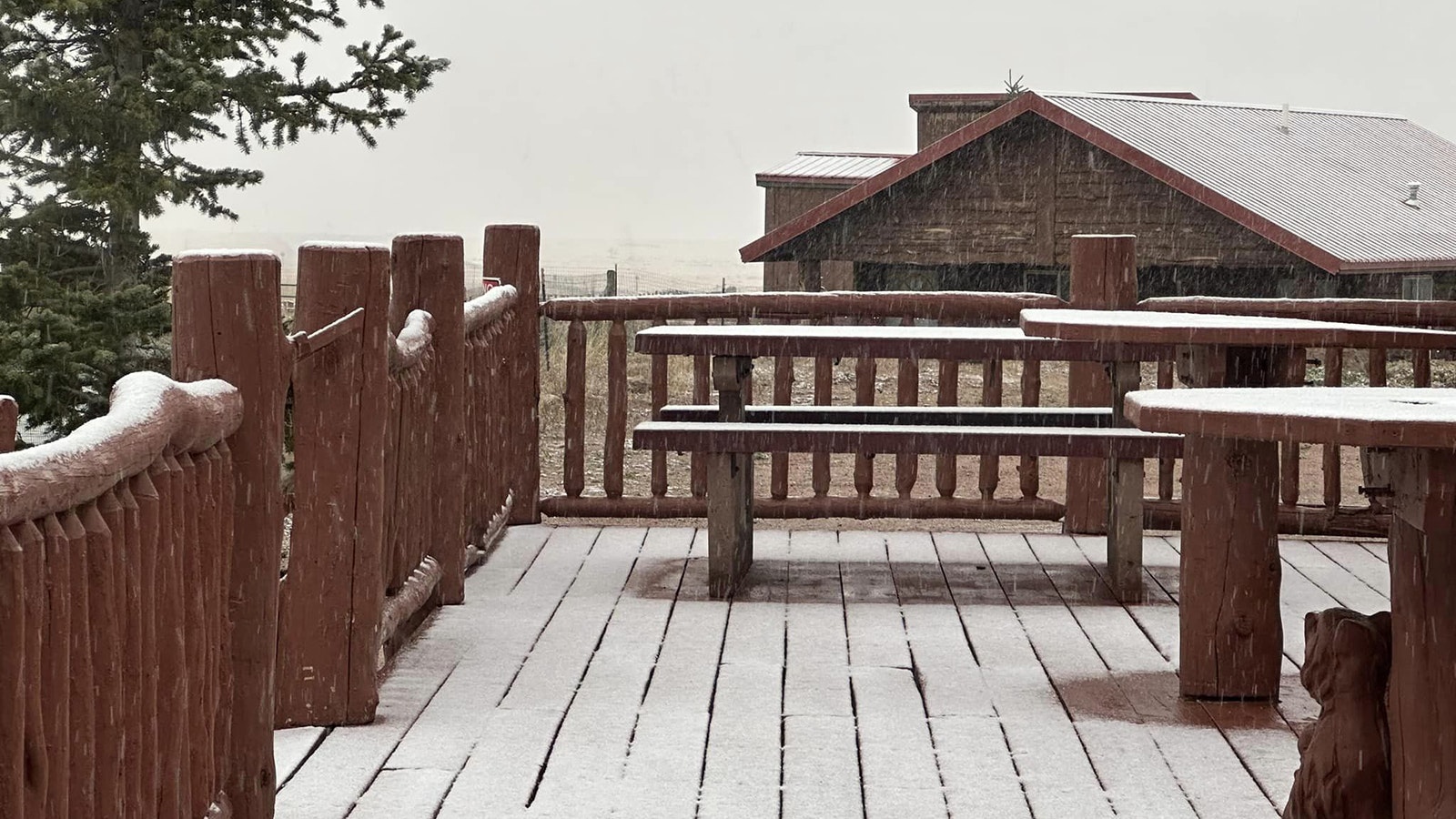 At the Elk View Inn near Burgess Junction and the southwestern border of the Elk Fire was excited Thrusday to post snow falling at the lodge.