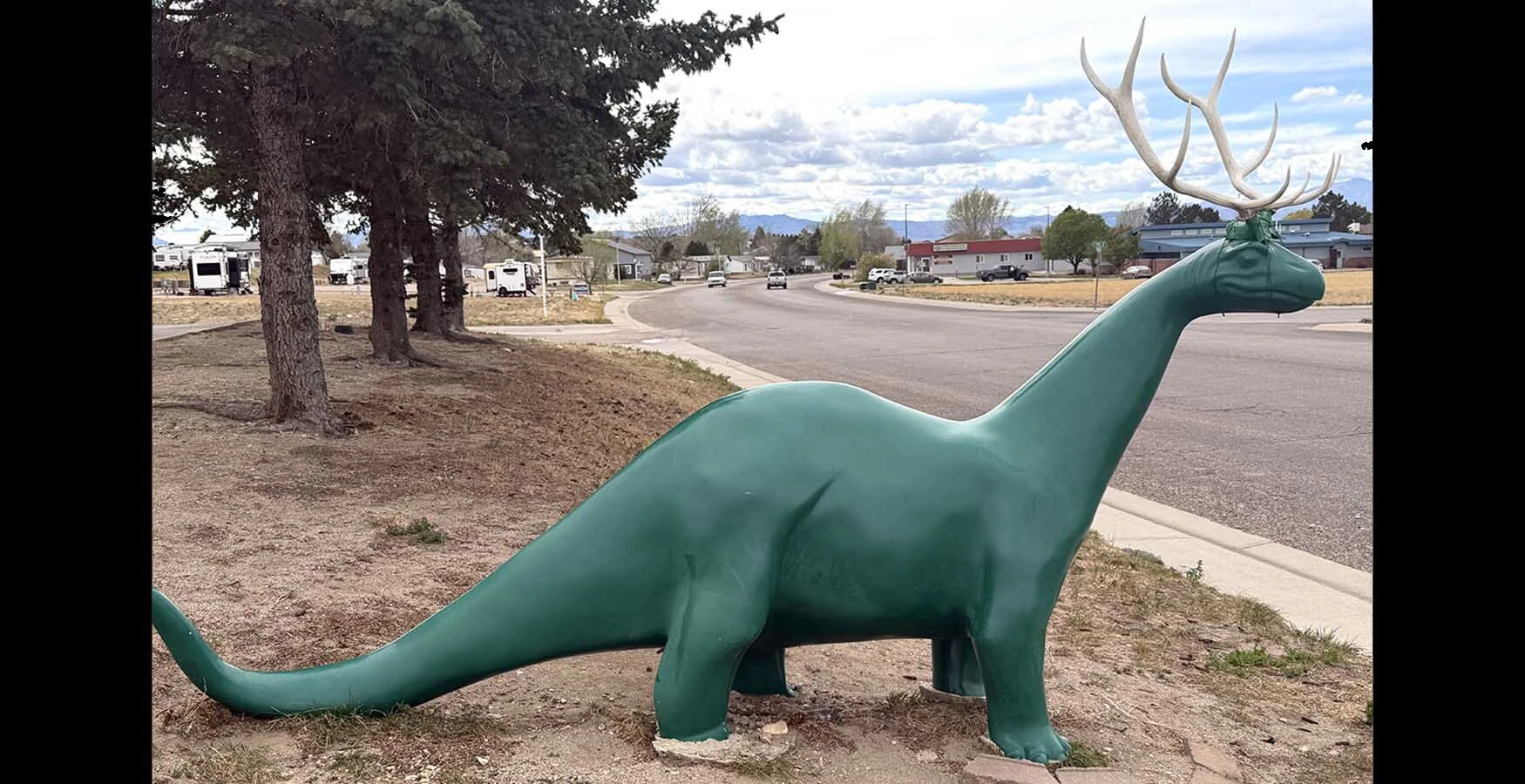 “Elkosaurus” started out as some harmless fun, but has turned into a selfie-trap along Interstate 25 in Wheatland. People are "freaking out about our little Elkosaurus,” says the manager of the Sinclair station about their green dinosaur with elk antlers attached.