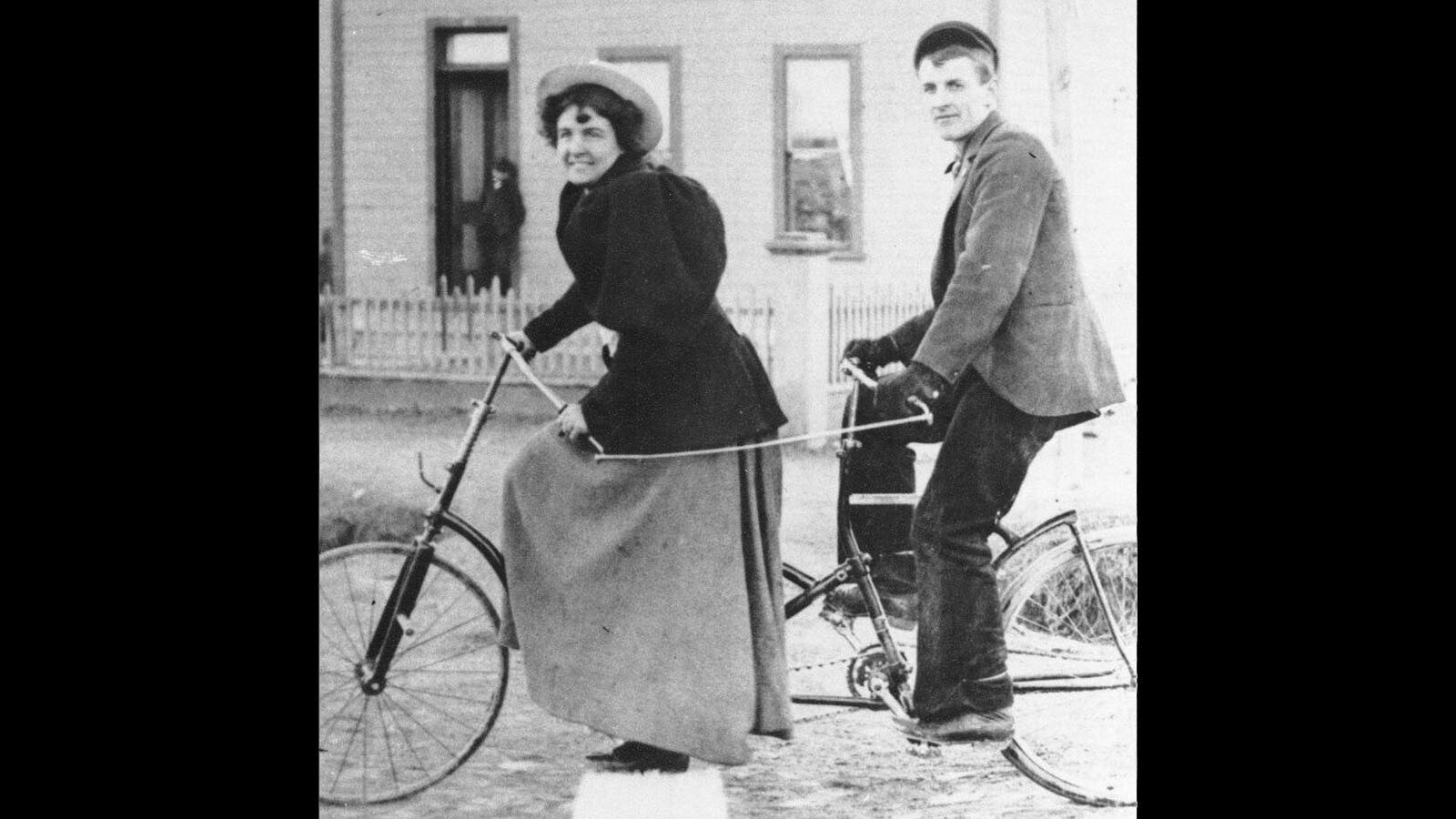 Nellie and Elmer Lovejoy enjoy a bike ride on a tandem bicycle he built.