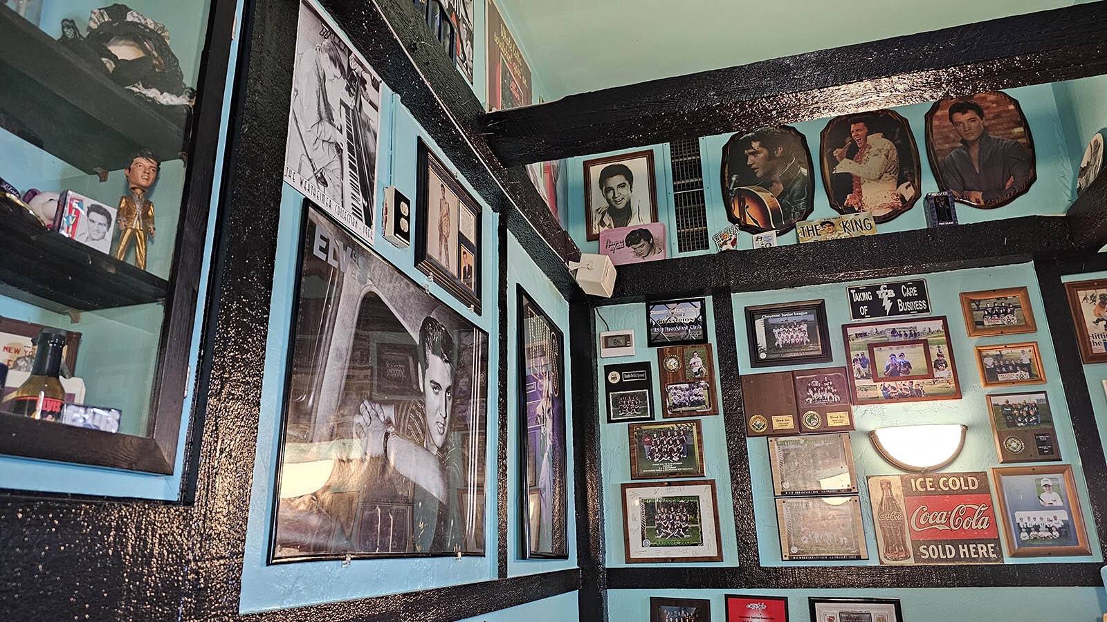 The walls are pure King kitsch with hundreds of photos, plaques and other Elvis memorabilia.