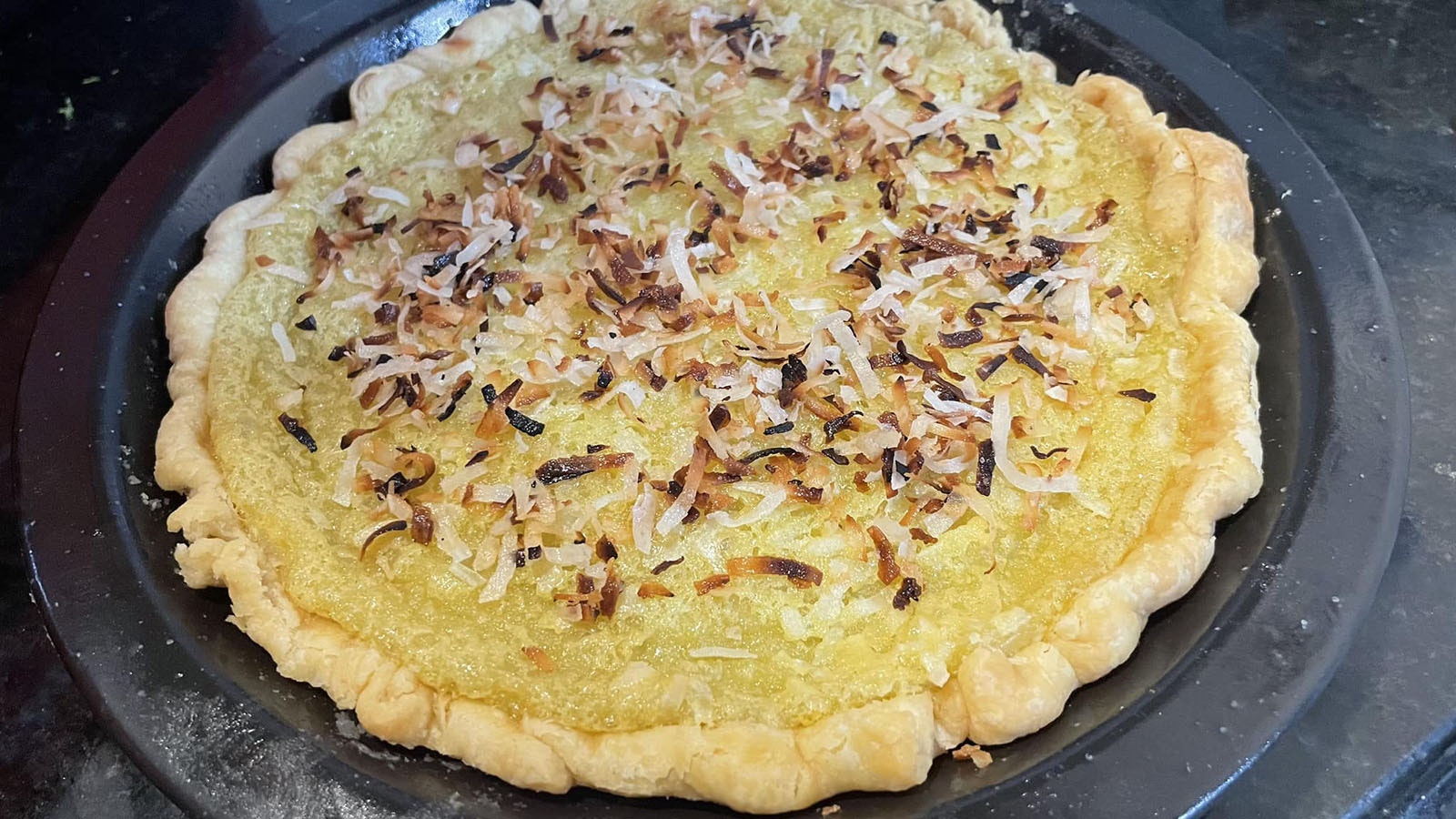 Lemon pie with toasted coconut.