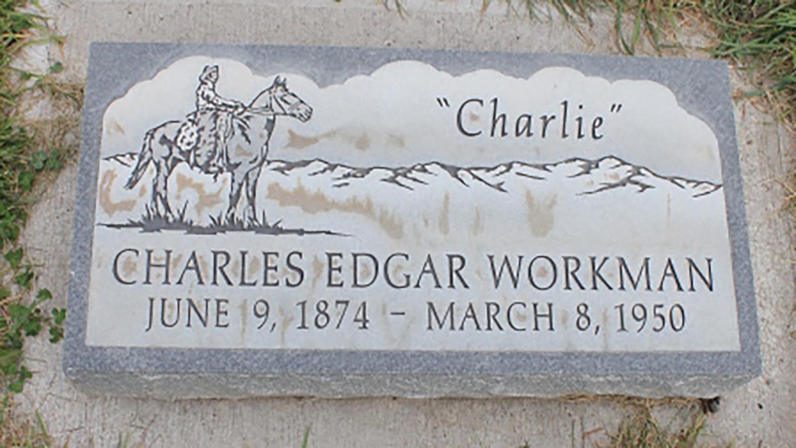 The grave marker of Charles Workman features a horse and rider.