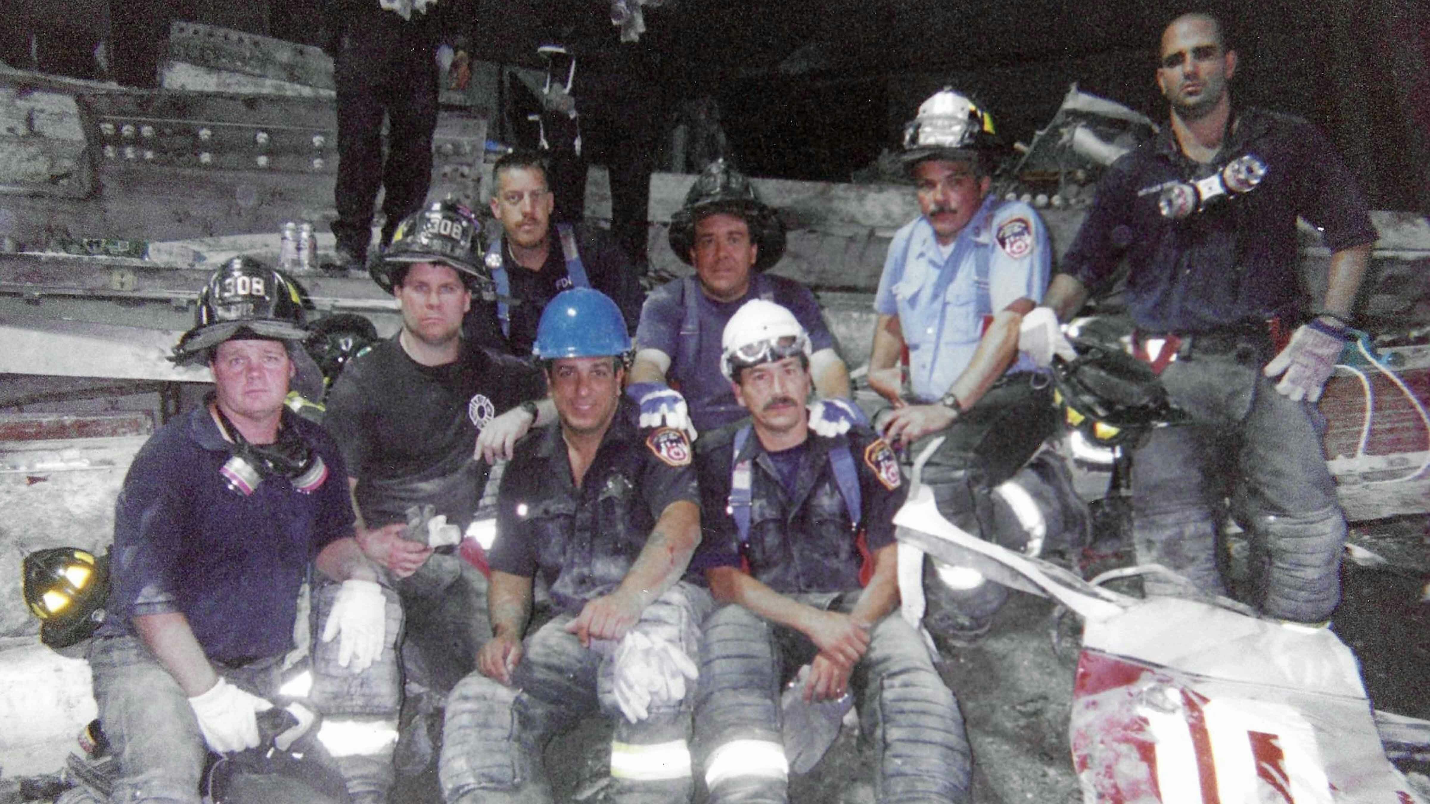 Members of Engine 308 after a full day at Ground Zero, September 17, 2001