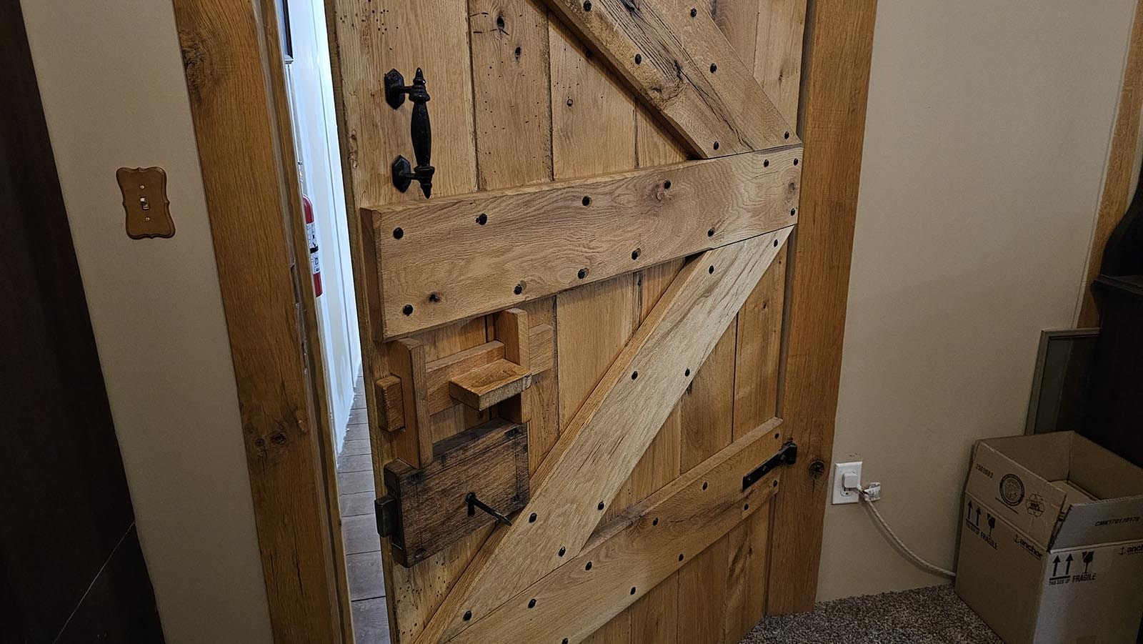 The bedroom doors have old-fashioned locking mechanisms in them, a little like a castle door might.