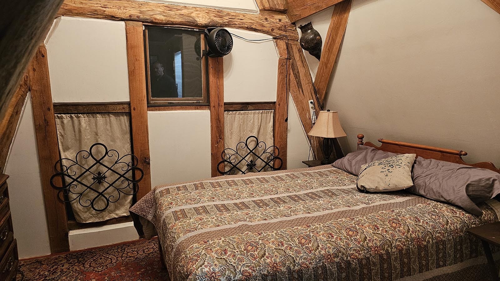 The guest room, which is at the very tippy top of Cyning Meadowcroft's cruck-constructed home, on the third floor.